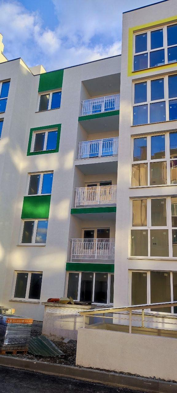 У Бузовій на Київщині відновлюють пошкоджений росіянами будинок: фото